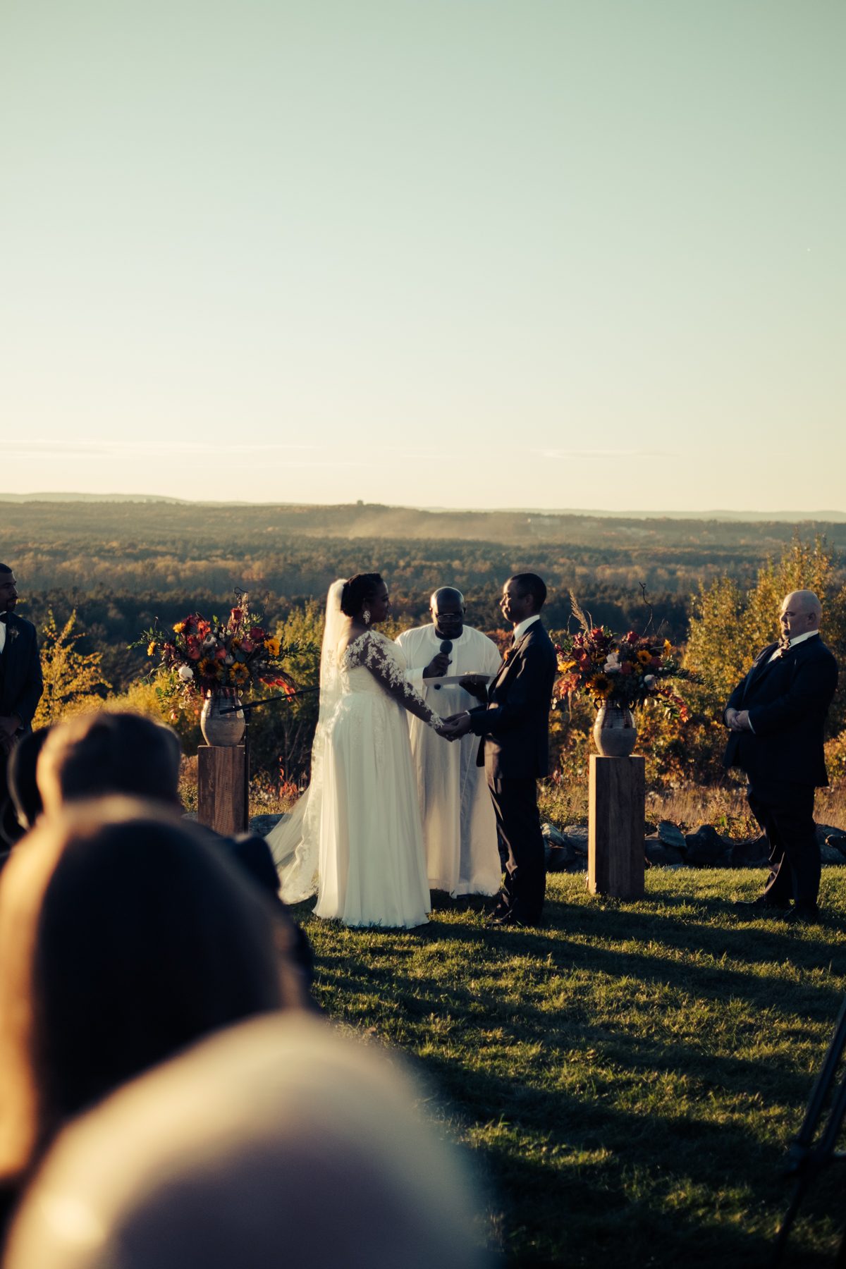 Hilltop ceremony with autumn vista