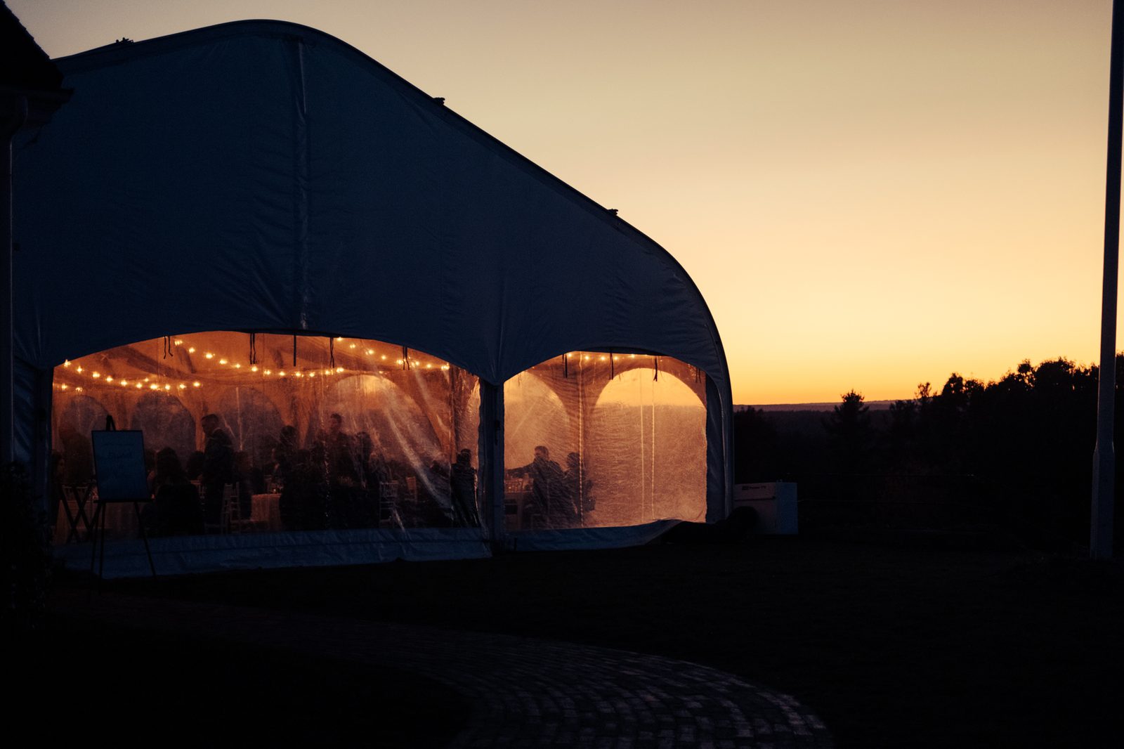 Reception tent at dusk